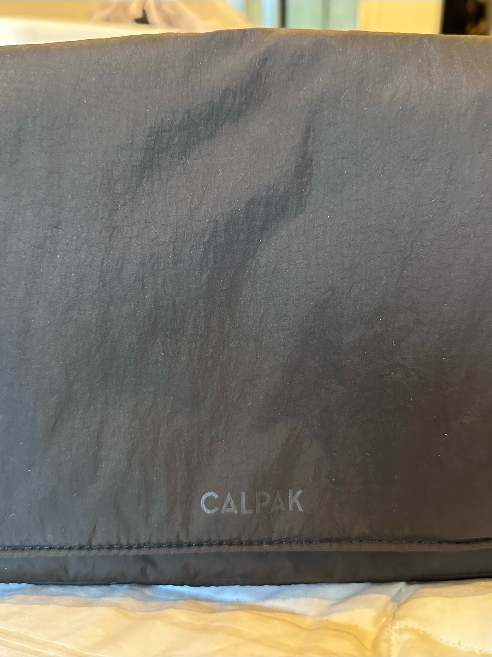 Calpak Black convertible caddy crossbody bag